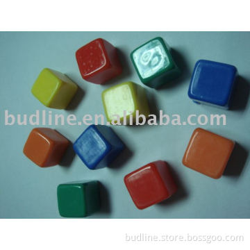 colored plastic dice